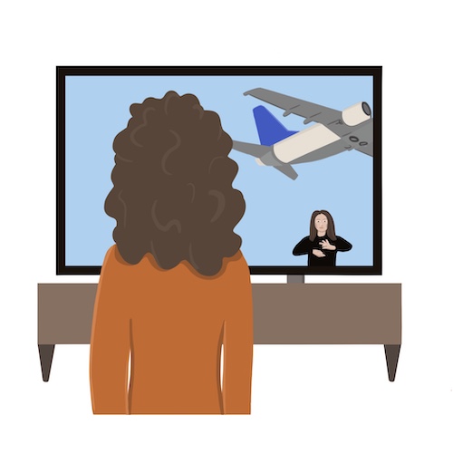 Rysunek kobiety, stojącej plecami do obserwatora a przodem do telewizora. Na ekranie telewizora widać fragment samolotu i interpreterkę języka migowego.